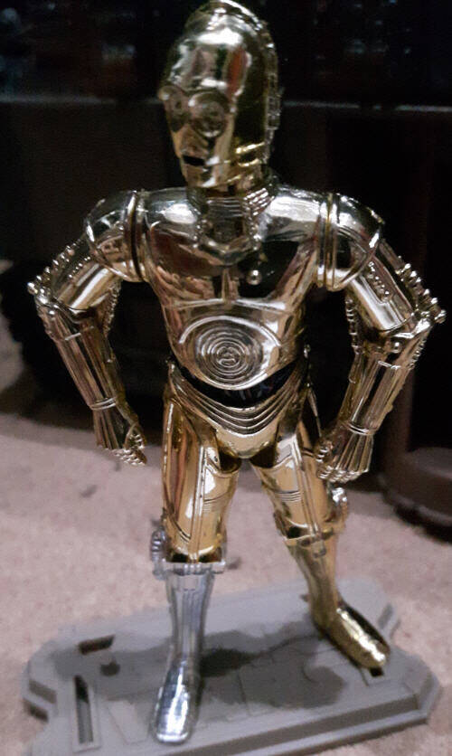 C-3PO Figure in front of Sandcrawler