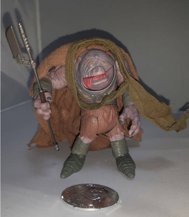 Hermi Odle action figure with Collectors Coin