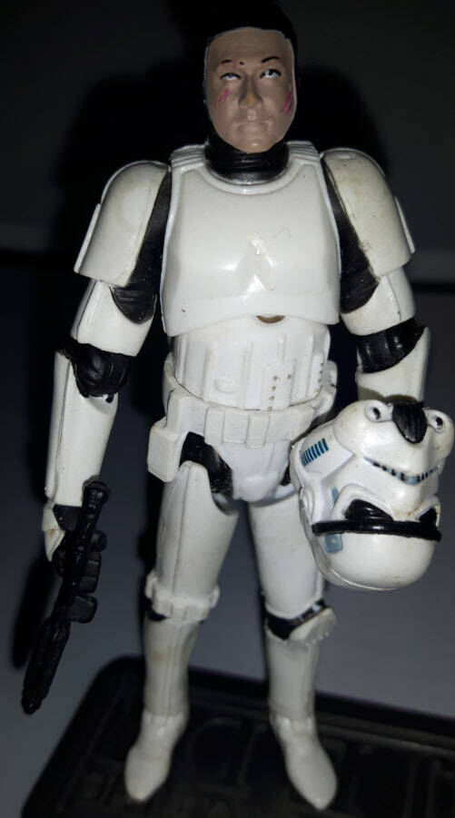 Stormtrooper Figure (Galactic Empire) carrying helmet