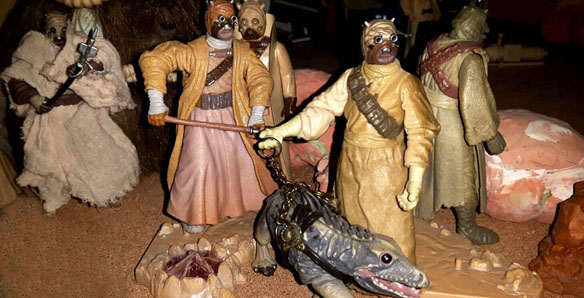 Tusken Raider action figures with Massif and camp fire